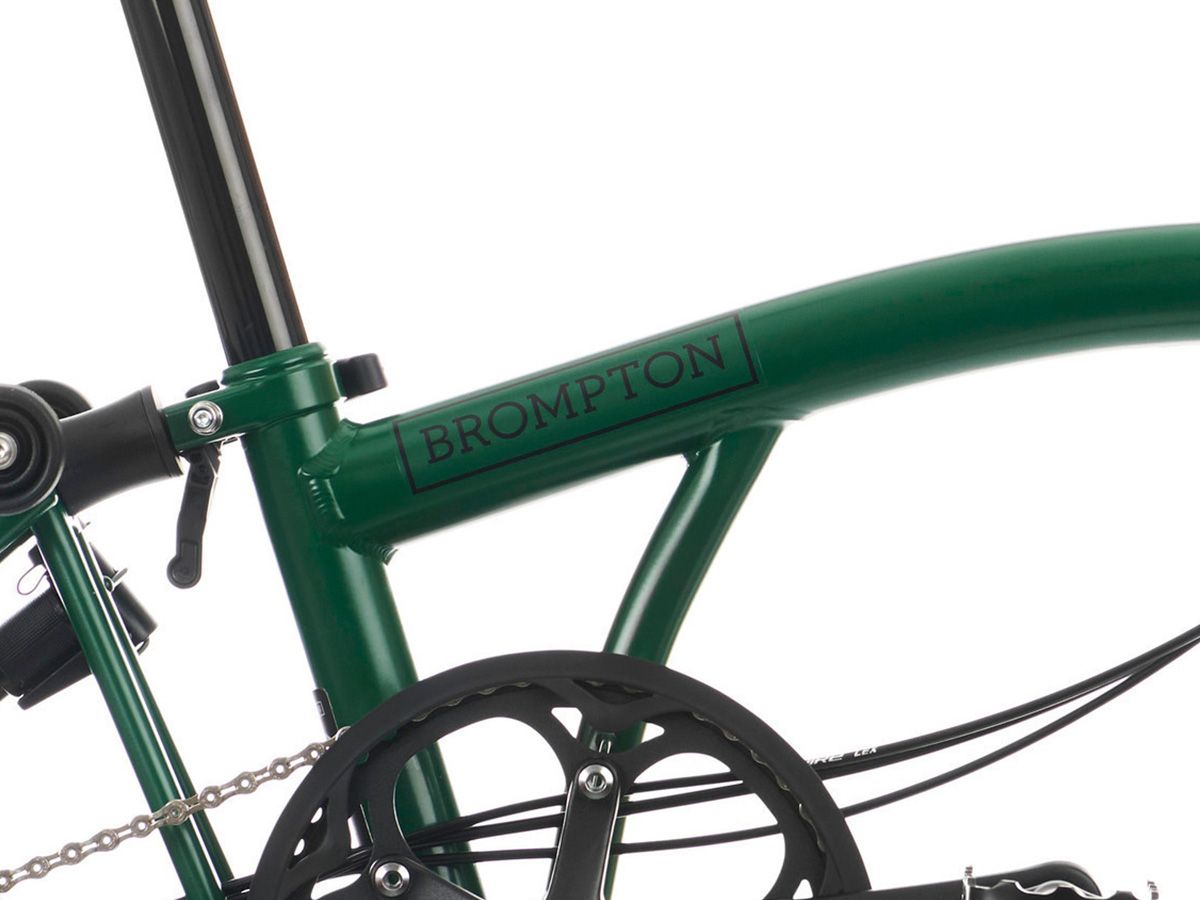 Brompton C Line Explore Racing Green - 6 speed with Low handlebar, with Front Carrier Block, with front/rear lights