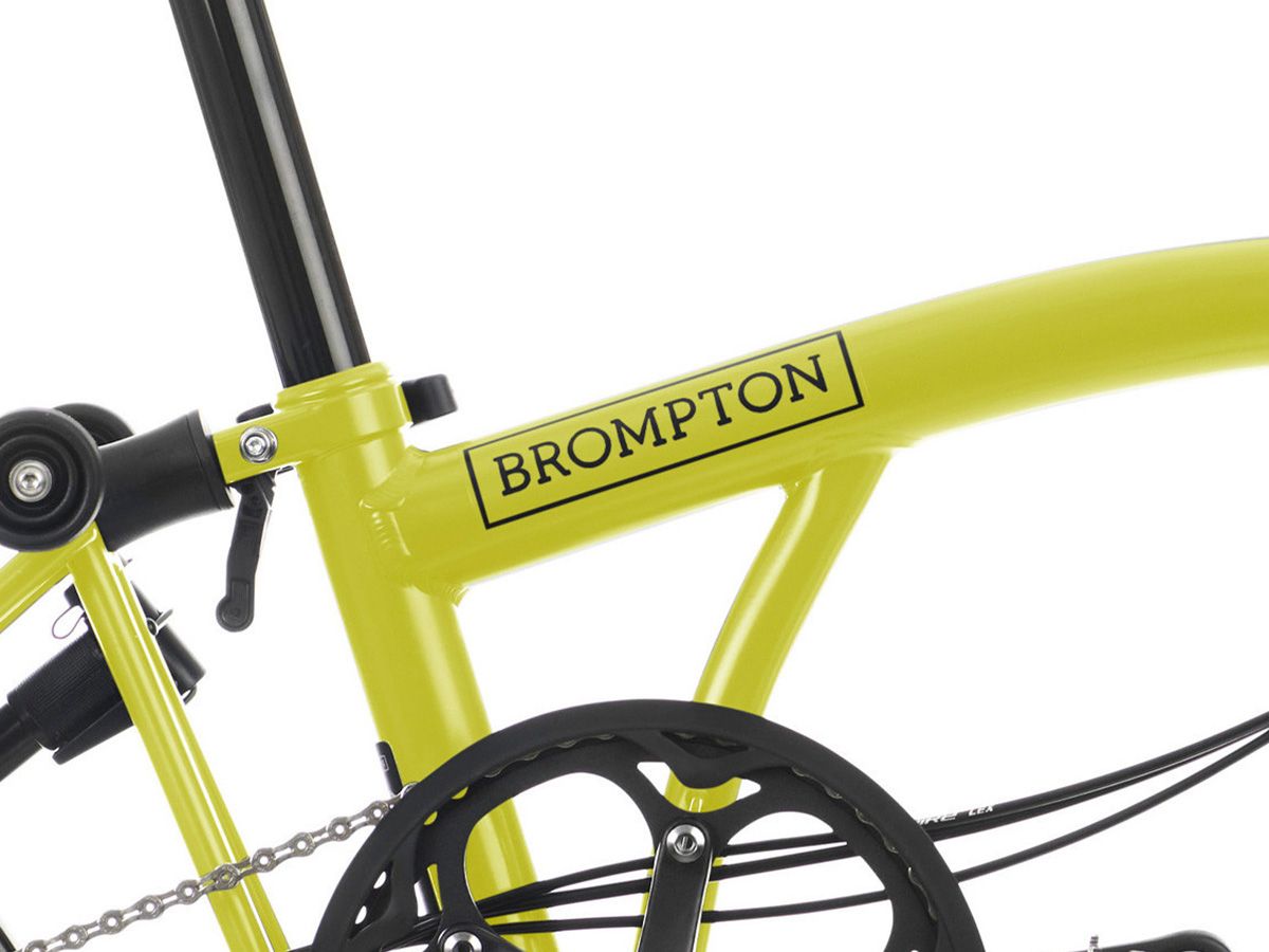 Brompton C Line Explore 2024 Yuzu Lime - 6 speed with Mid handlebar, with Front Carrier Block, with front/rear lights