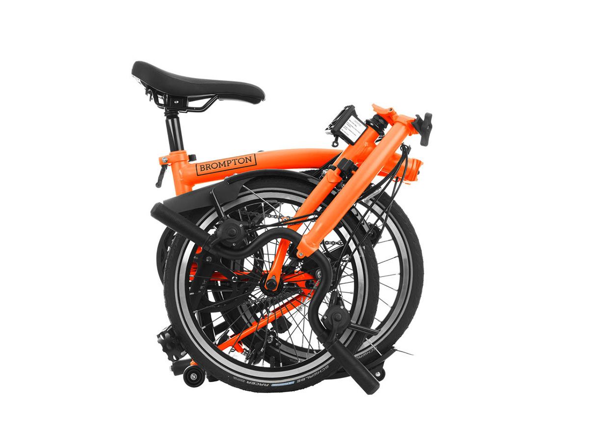 Brompton C Line Explore Sunset Orange - 6 speed with Mid handlebar, with Front Carrier Block and roller frame