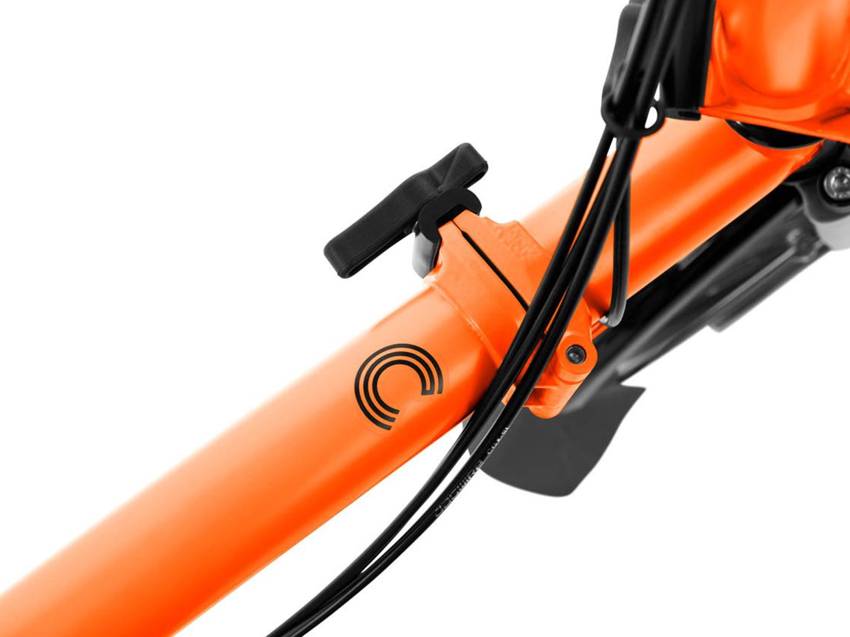 Brompton C Line Explore Sunset Orange - 6 speed with Mid handlebar, with Front Carrier Block and roller frame