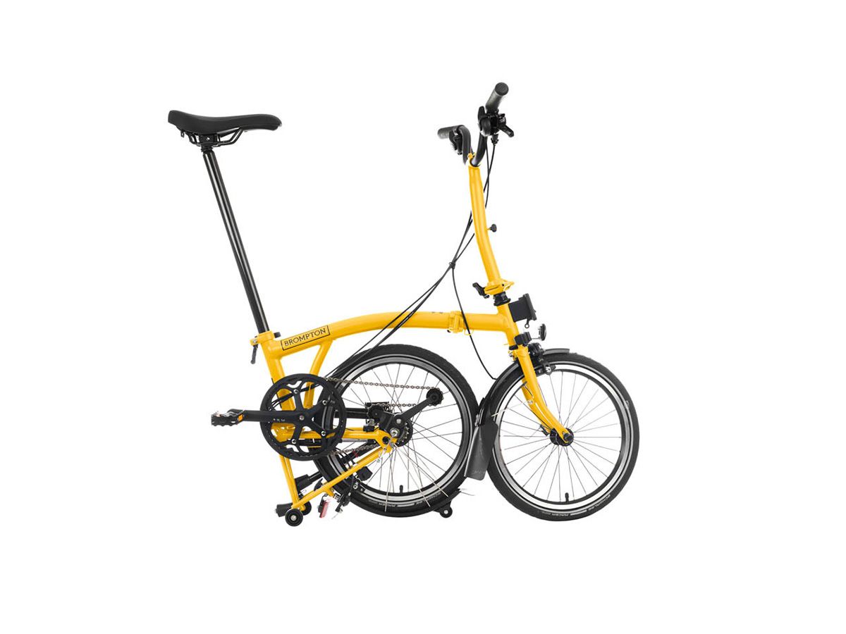 Brompton C Line Explore Bumblebee Yellow - 6 speed with Mid handlebar, with Front Carrier Block, with front/rear lights and roller frame