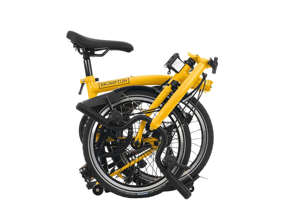 Brompton C Line Explore Bumblebee Yellow - 6 speed with Mid handlebar, with Front Carrier Block, with front/rear lights and roller frame